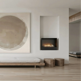 Modern living room with a fireplace, abstract painting, and decorative vases.