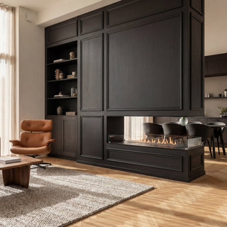 Modern living room with dark wood entertainment center, sofa, and coffee table.